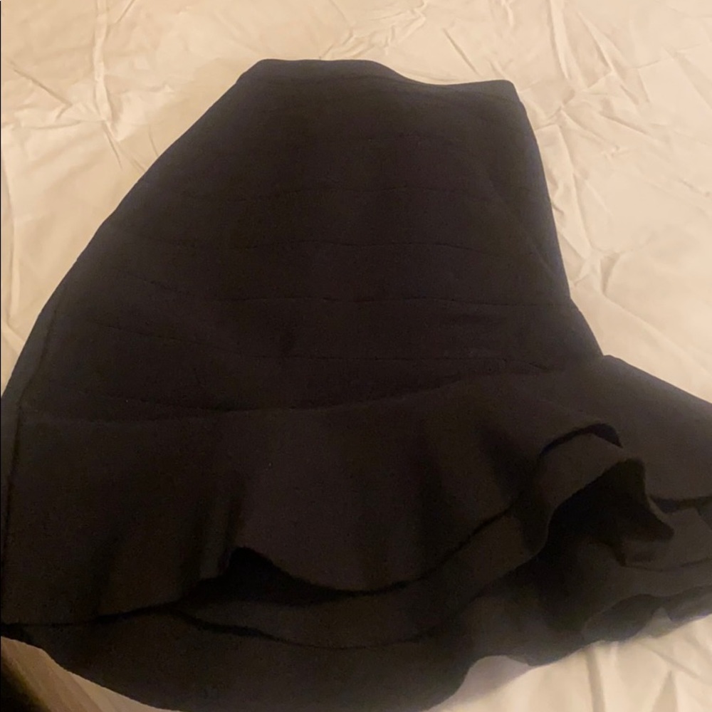Black peplum skirt